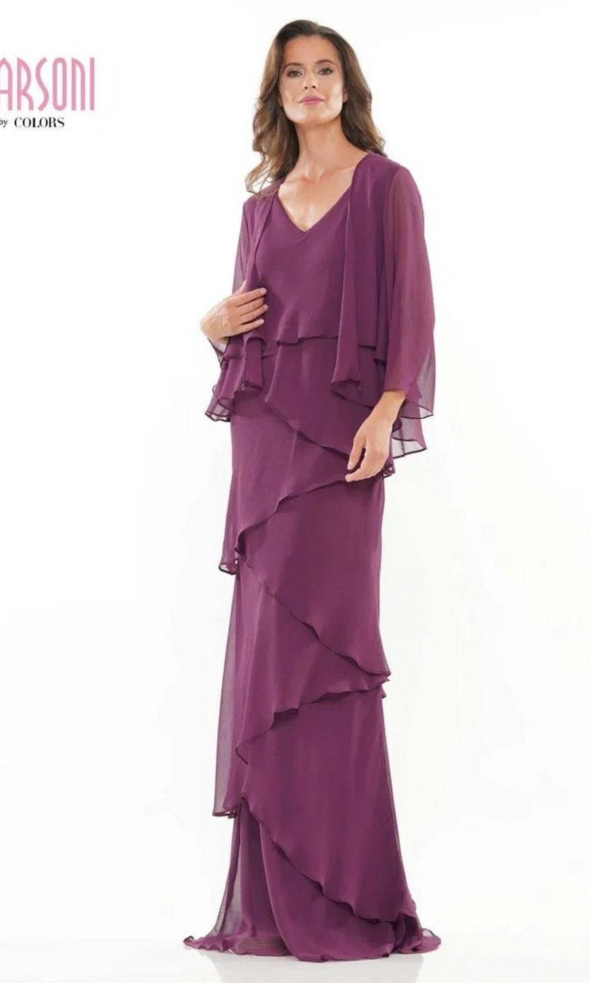 A woman poses against a plain white background in the Marsoni M309 long formal dress, featuring layered eggplant chiffon and sheer long sleeves—a stunning choice for mothers of the bride.